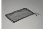 A rectangular black mesh luggage net for RC vehicles, featuring a drawstring closure on one side, isolated on a grey background.