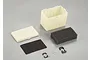 Killerbody plastic tote box kit including a cream-coloured container, lid, black foam inserts, and small black plastic and metal hardware components.