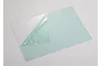 A rectangular sheet of clear Lexan polycarbonate with a protective blue film partially peeled back from one corner.