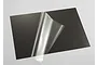 A rectangular sheet with a black carbon fiber pattern, shown with a clear protective film partially peeled back from the surface.
