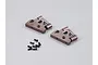 Two grey aluminium rear wing mounts for 1/10 RC cars with a set of small black screws on a plain grey background.