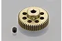 A gold-colored 48T 64dp pinion gear with a small black grub screw sitting on a reflective grey surface.