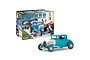 A Revell 1/25 scale 1930 Ford Model A Coupe plastic model kit box next to a fully assembled and painted teal hot rod model car.