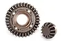 A Traxxas differential ring gear and a matching pinion gear made of dark grey metal on a white background.
