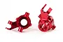 Two red anodized aluminium steering hubs for Traxxas Maxx 4S RC car, shown from different angles against a white background.