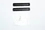 Two black rectangular RC ventilation port covers with a small plastic bag containing mounting screws and nuts on a white background.