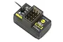 FlySky FS-FGR4B 4-channel micro receiver for RC models, featuring a black plastic case with gold-plated connection pins and yellow labels.