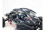 A T-Bone Racing external roll cage installed on a 1/10 scale Losi Lasernut RC truck, featuring a black plastic frame over the vehicle's cabin.