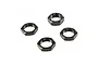 Four black serrated aluminium wheel nuts for RC vehicles arranged on a white background.