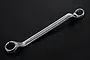 A chrome double-ended ring spanner with 16mm and 18mm sizes, set against a plain black background.