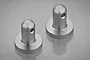 Two silver aluminium radio box mounting posts for RC cars, shown from a high angle against a grey background.