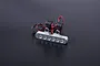 A silver aluminium LED tail light bar for an RC Baja vehicle with two black mounting brackets and red and black wiring.