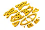 A set of yellow plastic suspension arms and components for an RC Baja vehicle, arranged on a white background.