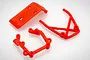 A set of three red plastic RC car bumper components on a white background.