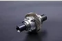 A complete silver aluminium RC differential assembly with a large brass-coloured gear, isolated against a dark grey background.