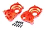 Two orange anodized aluminium differential case halves and eight black hex head screws on a white background.