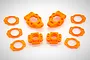 A set of bright orange Rovan RC rear hubs and matching shims arranged on a white background.