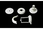 A set of white plastic RC air filter mount components arranged on a black background.