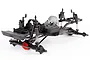 A studio shot of an Axial SCX10 II Raw Builder's V2 RC rock crawler chassis kit, showing the frame, suspension, and drivetrain components.