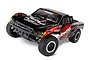 Traxxas Slash VXL 1/10 scale RC short course truck with a black and red body, featuring sponsor decals and off-road tires on a white background.