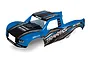 Traxxas Unlimited Desert Racer painted body shell in blue, black, and grey with sponsor decals.