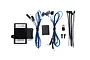 Traxxas TRX-4 light kit components including a power distribution block, LED light wires, zip ties, screws, and adhesive foam pad on a white background.