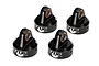 Four black aluminium Traxxas Fox shock caps arranged on a white background.