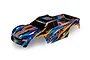 Traxxas Extended Maxx 4S ProGraphix body shell in orange, blue, and black with a pre-painted design.