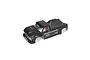 ARRMA 1/5 scale Outcast black painted RC truck body shell with pre-applied decals, shown from a high-angle studio view.