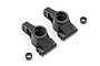 Two black plastic rear hub carriers and two small black spacers for an RC car, shown on a white background.