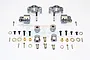 A set of silver aluminium RC car suspension parts including C-hubs, steering knuckles, wheel hex adapters, screws, and spacers on a white background.