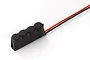 A Hobbywing capacitor module with four capacitors encased in black heat shrink tubing and two wires extending from one end.