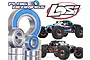A collection of metal ball bearings with blue rubber seals displayed alongside two Losi Lasernut Ultra 4 RC buggies and the Plaig Bearings logo.