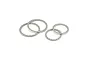 Four stone grey Pro-Line Impulse Pro-Loc beadlock rings for RC wheels arranged on a white background.