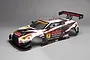 A 1/10 scale Killerbody B-MAX NDDP GT-R painted RC car body shell featuring white, silver, and black racing livery with various sponsor decals.