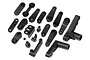 A collection of black plastic steering and servo linkage parts for an HPI Baja 5B RC car, arranged on a white background.