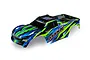 Traxxas Maxx 4S RC truck body shell featuring a green, blue, and black ProGraphix paint scheme with MAXX branding.