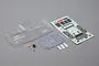 Unpainted clear polycarbonate Jeep JT Gladiator body shell for Axial SCX24 with included decal sheet, interior tray, and small mounting hardware.