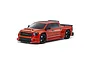 A studio shot of an orange Kyosho Fazer Mk2 2021 Toyota Tundra wide body RC truck on a white background.