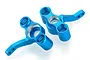 Two blue anodized aluminium RC steering hubs for HSP vehicles, shown from a high angle against a white background.