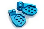 Two blue anodized aluminium rear body post mounts for an RC car, shown from a high angle on a white background.