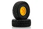 Two black rubber RC crawler tyres mounted on bright yellow plastic rims, stacked vertically against a white background.