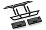 A set of black plastic RC car nerf bars and mounting brackets on a white background.