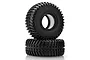 Two black rubber RC rock crawler tyres stacked on a white background.