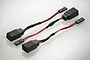 Two HSP turn signal adapter cables with black connectors and red and black wiring on a white background.