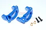 Two blue anodized aluminium RC front steering hub carriers with included screws and brass bushings on a white background.