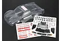 An unpainted, clear polycarbonate RC short course truck body shell for a Traxxas 1/16 Slash 4x4, accompanied by two decal sheets.