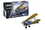Revell 1/32 scale Stearman PT-17 Kaydet plastic model kit box and a finished model of the blue and yellow biplane.