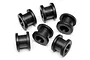 Six black rubber bushings arranged in a group on a white background.