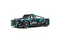 Side view of the Arrma Infraction 3S BLX RC truck in black and teal, featuring a street-bash style body and dBoots Hoons tires.